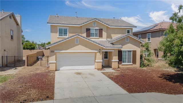 43629 Rucker Ct, Lancaster, CA 93535 - traditional-style home featuring a tile roof, fence, stucco siding, and driveway