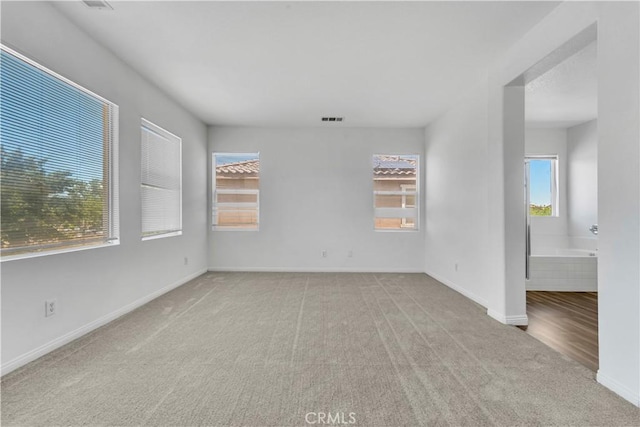 43629 Rucker Ct, Lancaster, CA 93535 - carpeted empty room featuring visible vents and baseboards