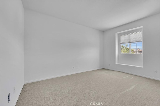 43629 Rucker Ct, Lancaster, CA 93535 - spare room featuring light colored carpet and baseboards