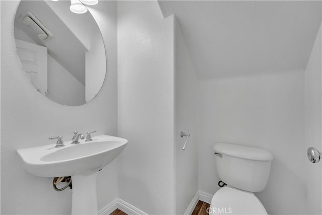 43629 Rucker Ct, Lancaster, CA 93535 - half bath with toilet, wood finished floors, and baseboards