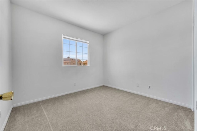 43629 Rucker Ct, Lancaster, CA 93535 - carpeted empty room featuring baseboards