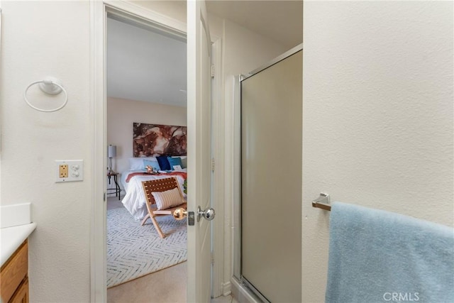35230 San Carlos St, Yucaipa, CA 92399 - ensuite bathroom featuring connected bathroom, vanity, and a stall shower