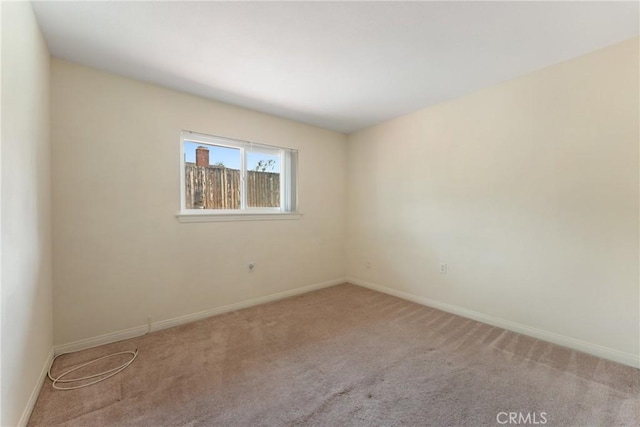 35230 San Carlos St, Yucaipa, CA 92399 - carpeted empty room featuring baseboards
