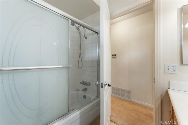 35230 San Carlos St, Yucaipa, CA 92399 - full bath with vanity, combined bath / shower with glass door, baseboards, and visible vents