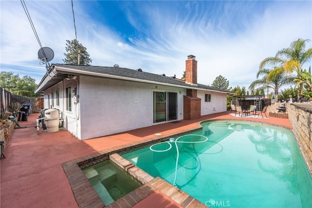 35230 San Carlos St, Yucaipa, CA 92399 - view of pool with a pool with connected hot tub, a patio, and a fenced backyard