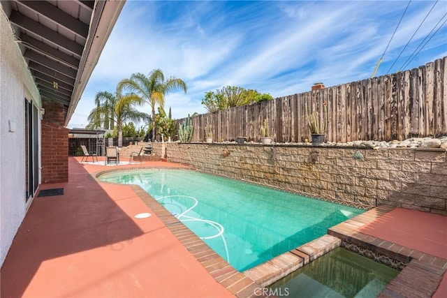 35230 San Carlos St, Yucaipa, CA 92399 - view of swimming pool with a patio area, a fenced in pool, and a fenced backyard