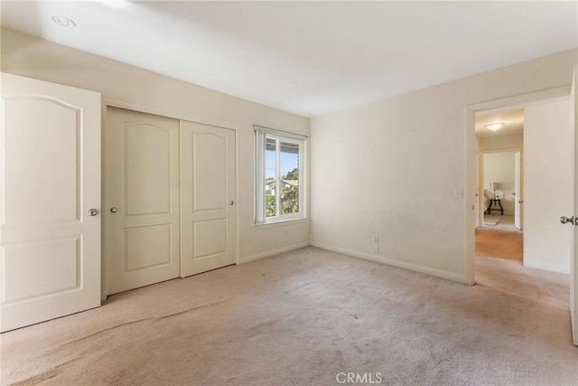 35230 San Carlos St, Yucaipa, CA 92399 - unfurnished bedroom with carpet floors, baseboards, and a closet