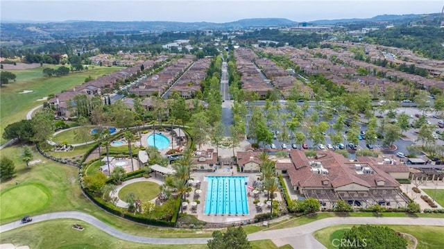 bird's eye view featuring golf course view and a residential view