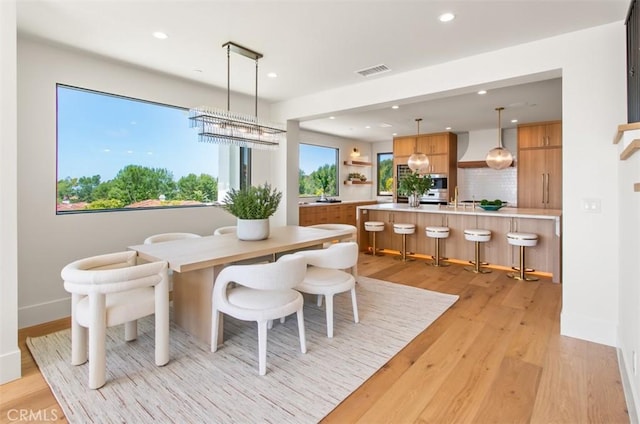 4 Sunset Cv, Newport Coast, CA 92657 - dining area featuring baseboards, recessed lighting, light wood finished floors, and visible vents