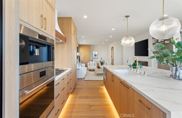 4 Sunset Cv, Newport Coast, CA 92657 - kitchen with a sink, light brown cabinets, and modern cabinets