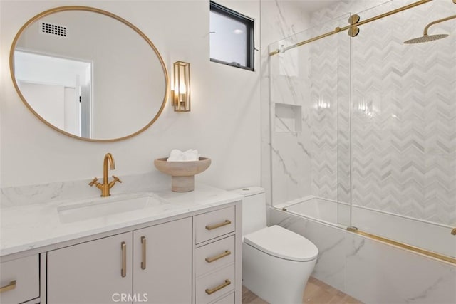 4 Sunset Cv, Newport Coast, CA 92657 - bathroom with toilet, vanity, visible vents, and shower / bath combination with glass door