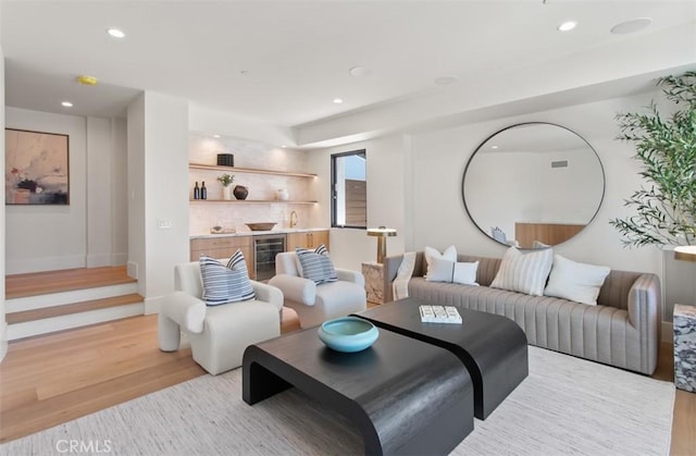 4 Sunset Cv, Newport Coast, CA 92657 - living area featuring wine cooler, light wood-style flooring, and recessed lighting