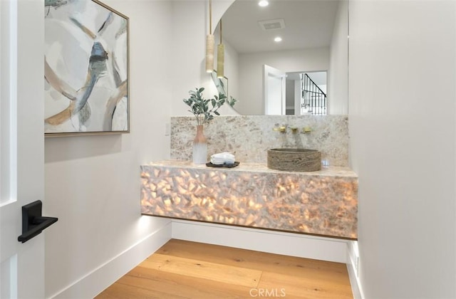 4 Sunset Cv, Newport Coast, CA 92657 - details with recessed lighting, baseboards, visible vents, wood finished floors, and arched walkways