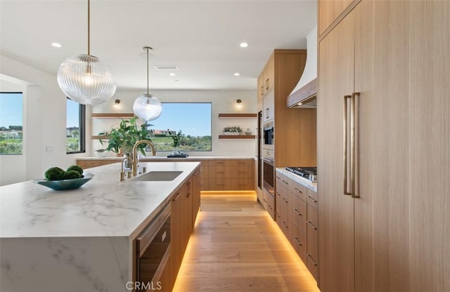 4 Sunset Cv, Newport Coast, CA 92657 - kitchen with a sink, open shelves, a center island with sink, modern cabinets, and premium range hood