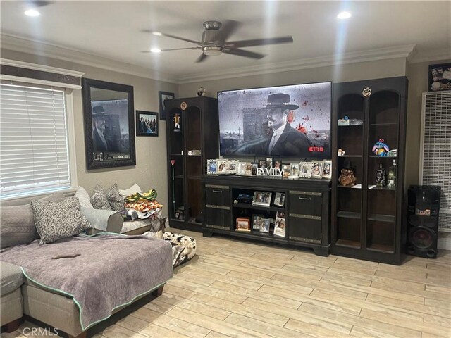cinema with a heating unit, crown molding, wood finished floors, and ceiling fan