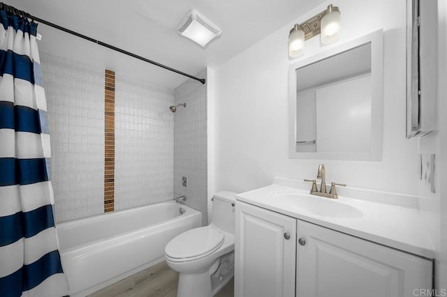 full bath with toilet, wood finished floors, vanity, shower / tub combo with curtain, and visible vents