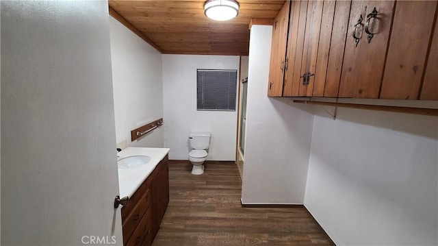 31194 Outer Highway 18 N, Running Springs, CA 92382 - bathroom featuring wood ceiling, vanity, toilet, wood finished floors, and shower / bath combination with glass door