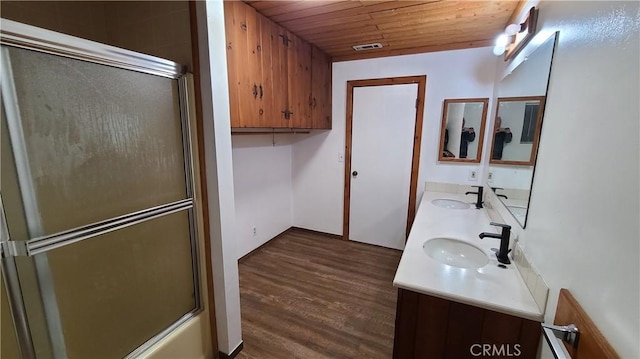 31194 Outer Highway 18 N, Running Springs, CA 92382 - bathroom with wood finished floors, wood ceiling, double vanity, and enclosed tub / shower combo
