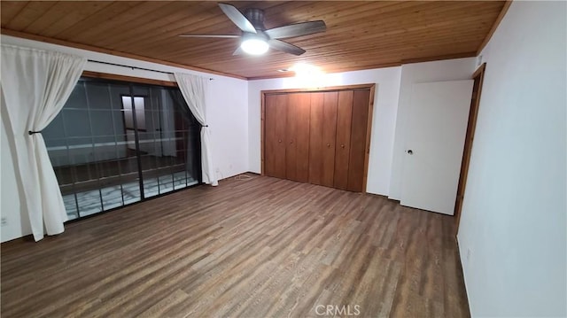 31194 Outer Highway 18 N, Running Springs, CA 92382 - unfurnished bedroom featuring wooden ceiling, wood finished floors, a closet, and a ceiling fan