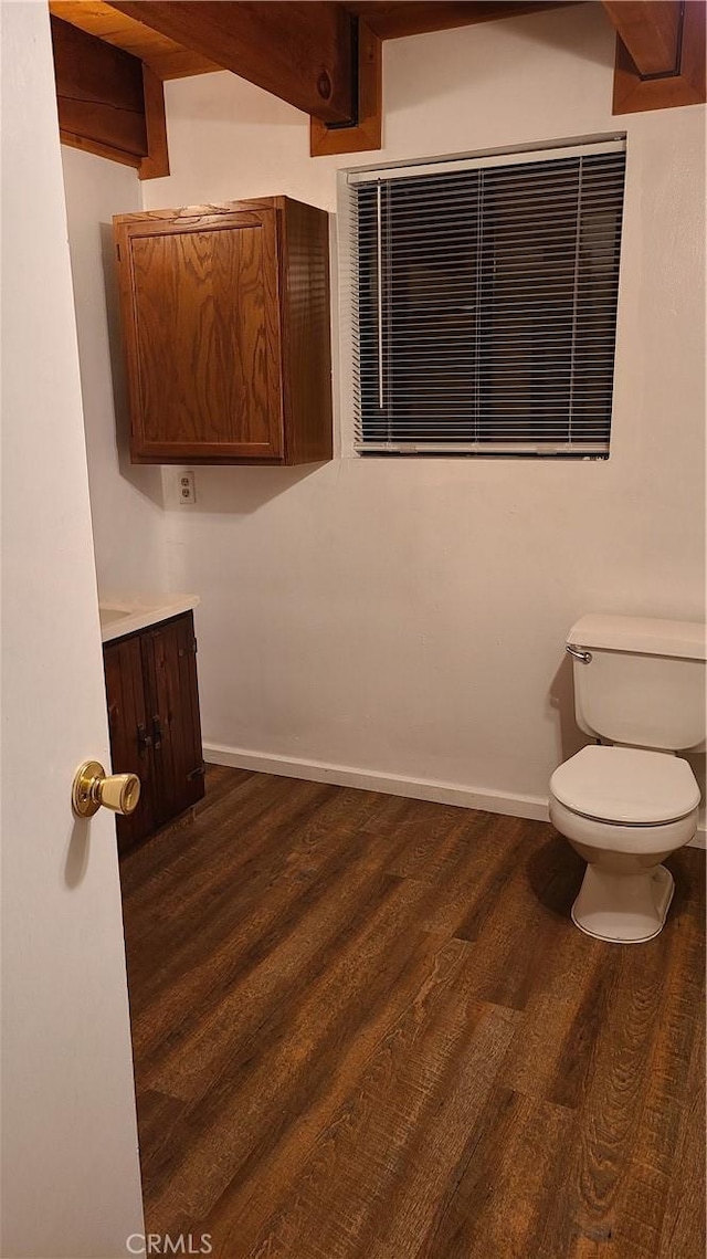 31194 Outer Highway 18 N, Running Springs, CA 92382 - bathroom featuring toilet, wood finished floors, vanity, and baseboards