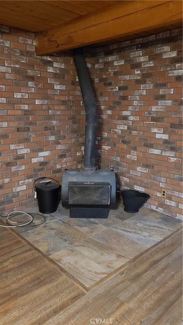 31194 Outer Highway 18 N, Running Springs, CA 92382 - detailed view of brick wall and a wood stove