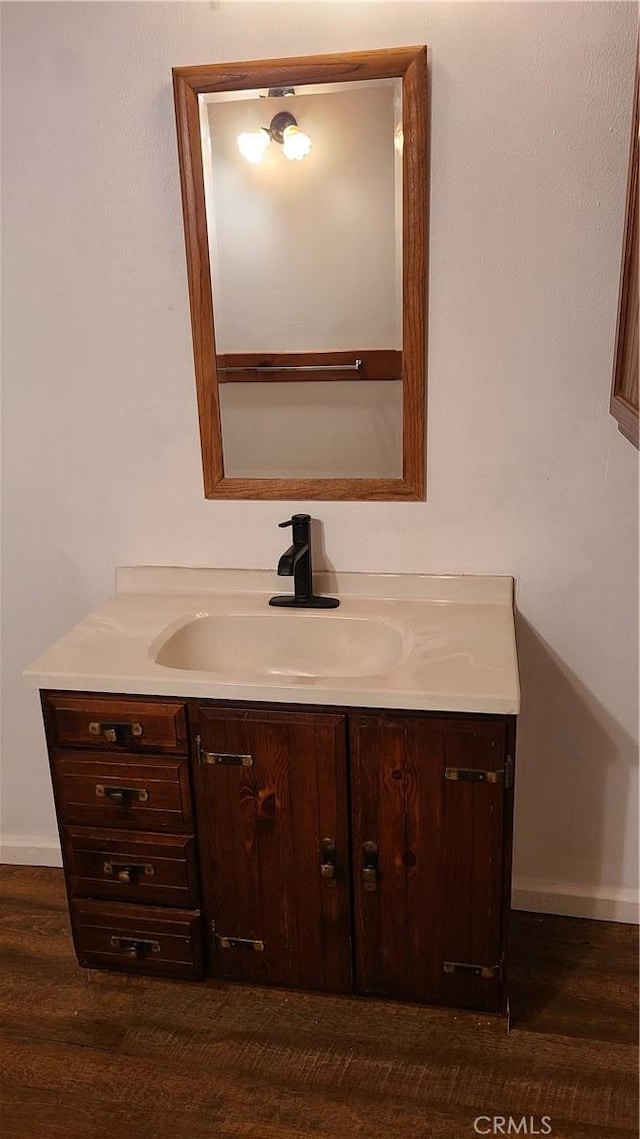 31194 Outer Highway 18 N, Running Springs, CA 92382 - bathroom with vanity, baseboards, and wood finished floors