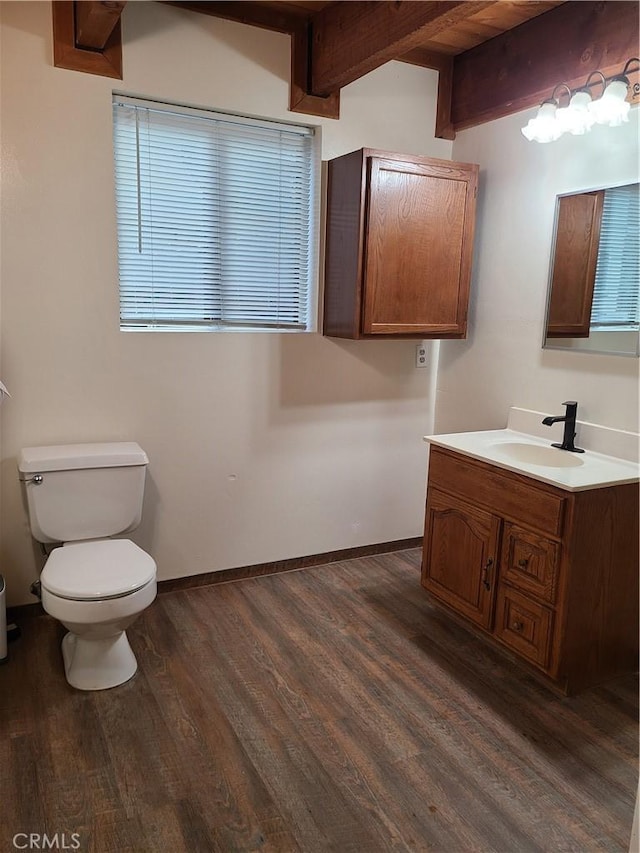 31194 Outer Highway 18 N, Running Springs, CA 92382 - half bath featuring toilet, vanity, wood finished floors, and baseboards