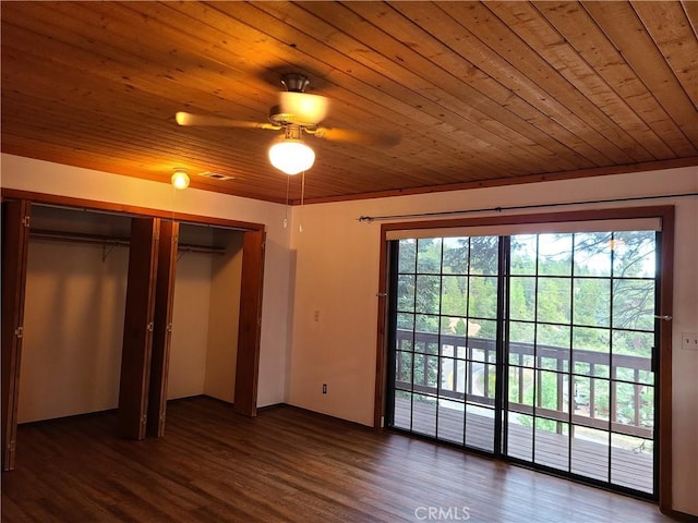 31194 Outer Highway 18 N, Running Springs, CA 92382 - unfurnished bedroom with access to exterior, multiple windows, wood ceiling, wood finished floors, and a closet