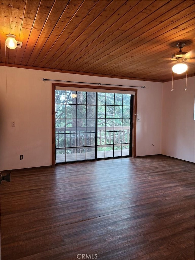 31194 Outer Highway 18 N, Running Springs, CA 92382 - unfurnished room with healthy amount of natural light, wooden ceiling, a ceiling fan, and dark wood-type flooring