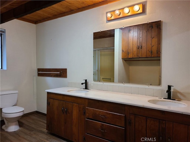 31194 Outer Highway 18 N, Running Springs, CA 92382 - bathroom with wood ceiling with exposed beams, wood finished floors, toilet, double vanity, and a shower stall