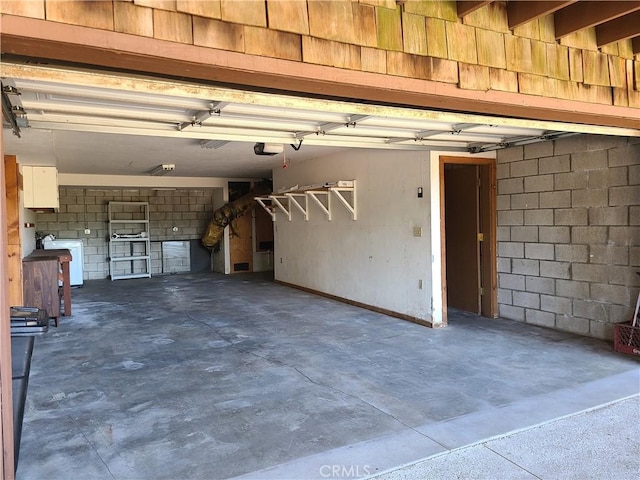 31194 Outer Highway 18 N, Running Springs, CA 92382 - garage with a garage door opener and separate washer and dryer