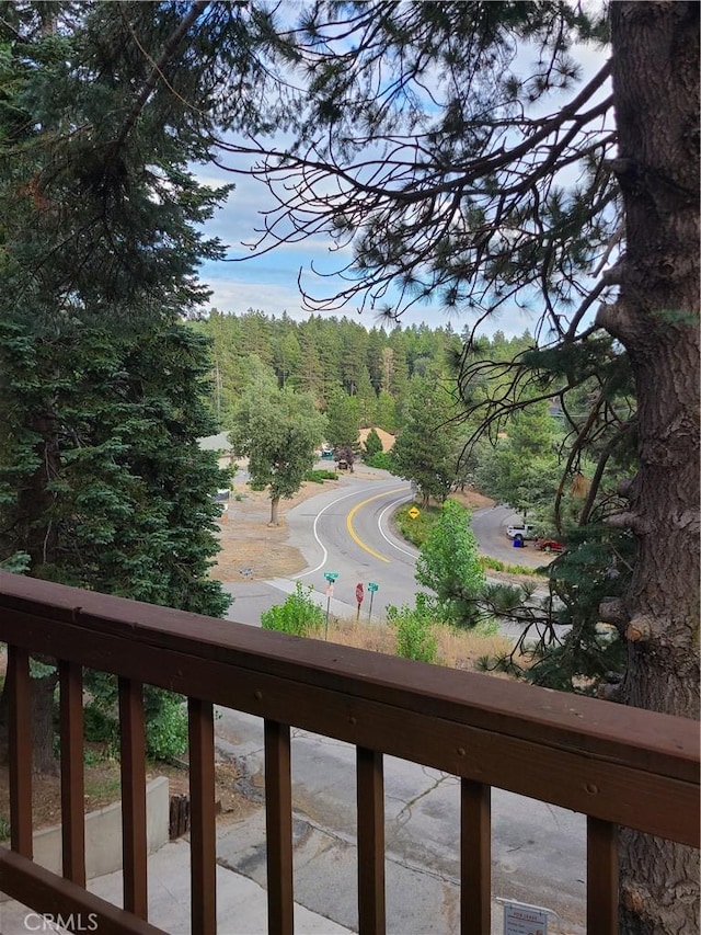 31194 Outer Highway 18 N, Running Springs, CA 92382 - exterior space with a balcony and a view of trees