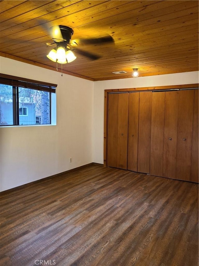 31194 Outer Highway 18 N, Running Springs, CA 92382 - unfurnished bedroom featuring wooden ceiling, dark wood-style floors, a closet, and ceiling fan