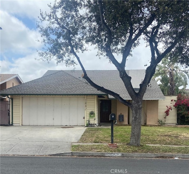 1882 E Larch St, Simi Valley, CA 93065 - single story home with a shingled roof, a garage, a front lawn, and driveway