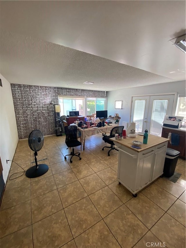 1882 E Larch St, Simi Valley, CA 93065 - tiled office with brick wall, a textured ceiling, and french doors