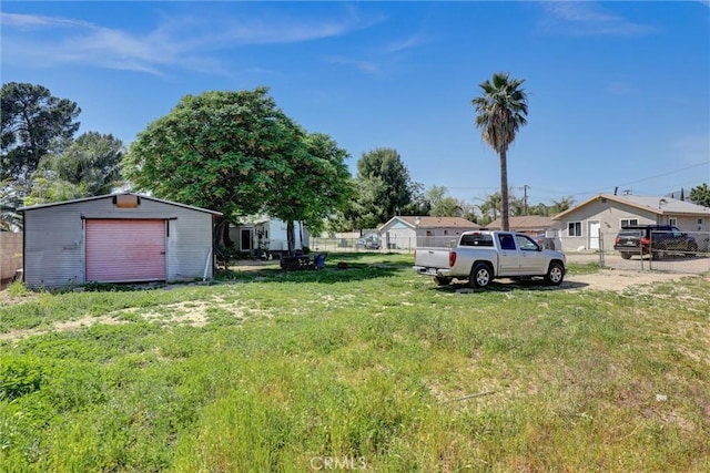 3001 N State St, San Bernardino, CA 92407 - view of yard featuring fence and an outbuilding