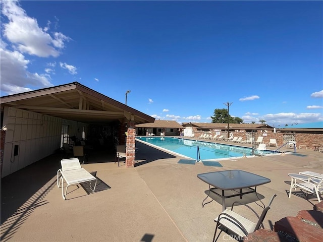 25805 Musselburgh Dr, Menifee, CA 92586 - community pool featuring a patio area