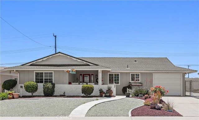 25805 Musselburgh Dr, Menifee, CA 92586 - ranch-style house with an attached garage, driveway, a shingled roof, and fence