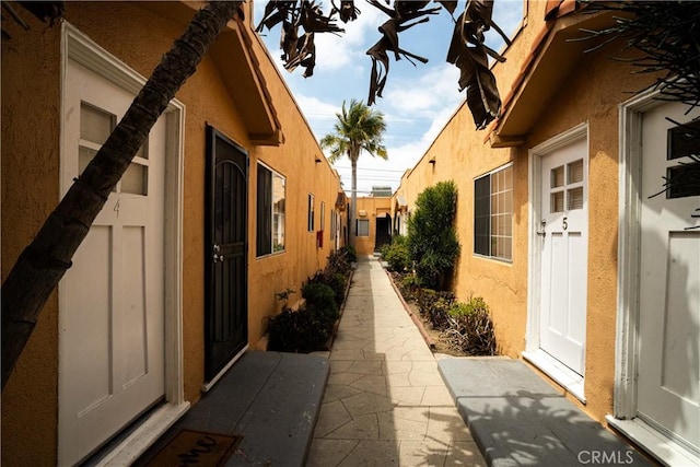 view of side of property featuring stucco siding