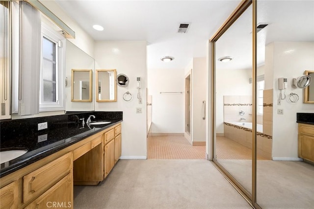 1206 Arno Dr, Sierra Madre, CA 91024 - bathroom with double vanity, baseboards, and a tub