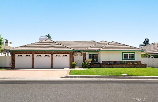 1206 Arno Dr, Sierra Madre, CA 91024 - ranch-style home featuring an attached garage, a tiled roof, brick siding, and driveway