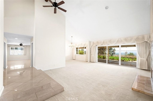 1206 Arno Dr, Sierra Madre, CA 91024 - unfurnished living room featuring high vaulted ceiling, ceiling fan, a chandelier, healthy amount of natural light, and carpet flooring