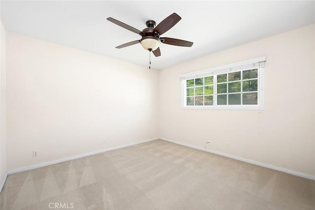 1206 Arno Dr, Sierra Madre, CA 91024 - empty room featuring light carpet, baseboards, and a ceiling fan