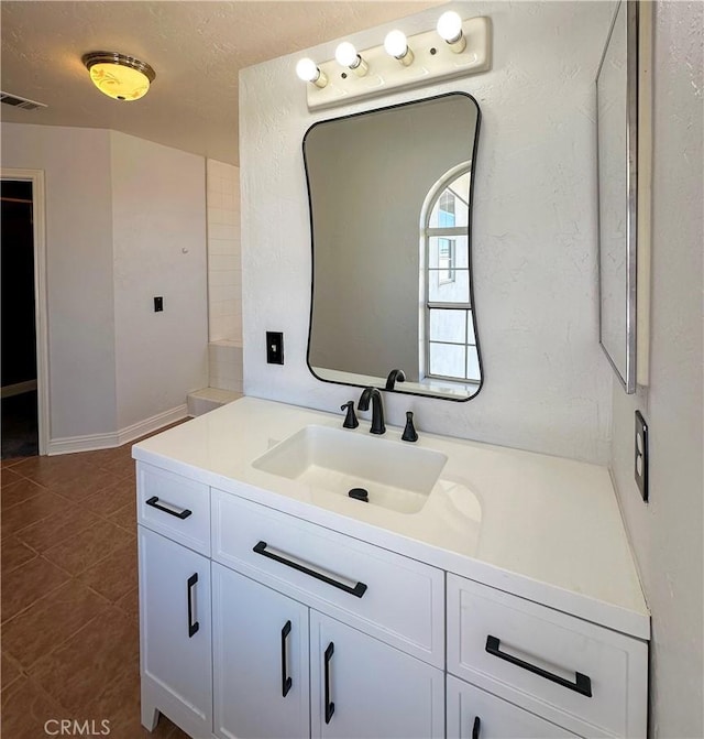 bathroom featuring vanity and tile patterned floors