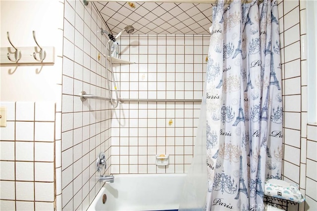 bathroom featuring shower / bathtub combination with curtain