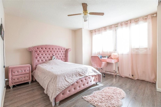 9653 La Tuna Canyon Rd, Sun Valley, CA 91352 - bedroom featuring wood finished floors and a ceiling fan