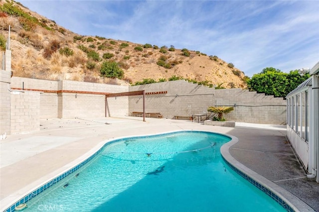 9653 La Tuna Canyon Rd, Sun Valley, CA 91352 - view of swimming pool featuring a fenced backyard, a patio, a fenced in pool, and a mountain view