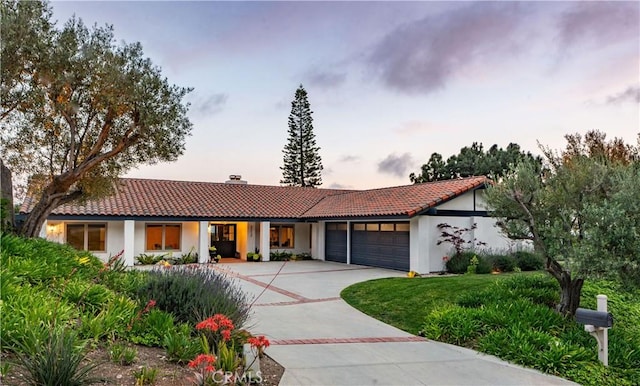 3212 Barkentine Rd, Rancho Palos Verdes, CA 90275 - ranch-style house with a tile roof, concrete driveway, a garage, and stucco siding