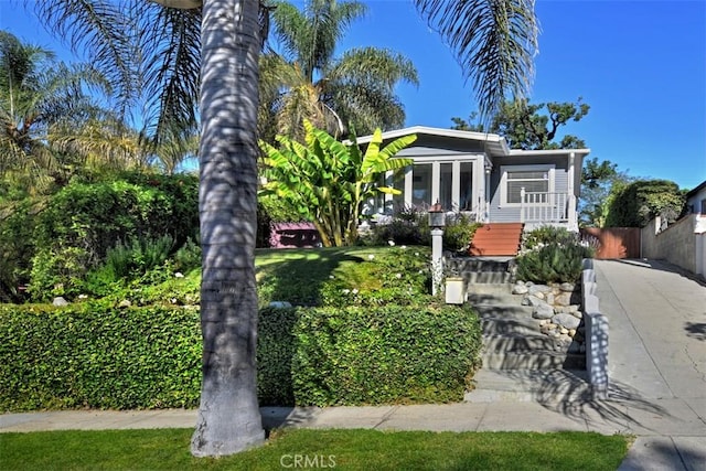 view of front of property with fence