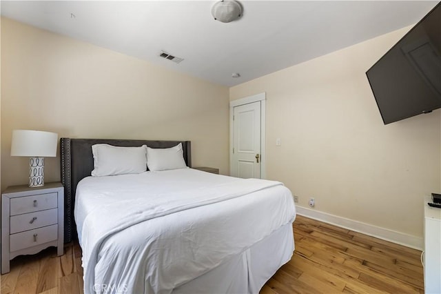 10633 Chiquita St, Toluca Lake, CA 91602 - bedroom featuring light wood finished floors and baseboards